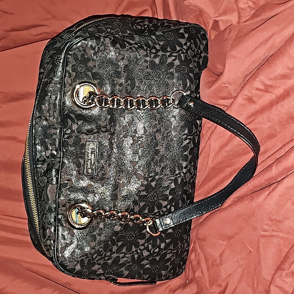Kate Spade Black leather laser cut handbage.